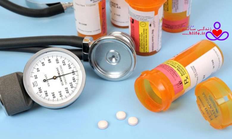 bottles-of-pills-with-a-stethoscope-and-blood-pressure-meter فشار خون بالا